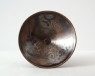 Black ware tea bowl with prunus under a crescent moon (oblique)