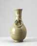 Greenware vase with handles in the form of dragons (oblique)