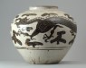 Cizhou type jar with a dragon and phoenix (oblique)