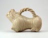 Greenware huzi, or male chamber pot, in the form of a tiger (oblique)