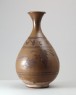 Black ware vase with 'tea-dust' glazes (oblique)