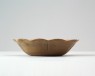 Greenware lobed bowl in the form of a flower (oblique)