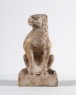 Figure of a seated lion (oblique)