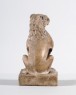 Figure of a seated lion (oblique)