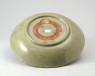 Greenware dish with lotus decoration (oblique)