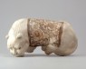 White ware pillow in the form of a lion (oblique)