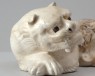 White ware pillow in the form of a lion (oblique)