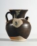 Huangdao black ware ewer with white splashes (oblique)