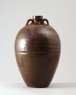 Black ware wine bottle with 'tea-dust' glazes (oblique)