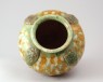 Jar with appliqué arabesque decoration under a three colour glaze (oblique)