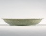 Greenware dish with foliated rim (oblique)