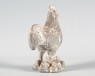 Figure of a cockerel (oblique)