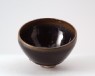 Black ware tea bowl with 'hare's fur' glazes (oblique)