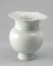 White ware vase with lobed rim and floral decoration (oblique)