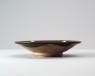 Black ware bowl with leaf decoration (oblique)