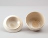 White ware bowl and lid with lotus petal decoration (oblique)