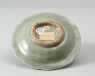 Greenware dish with floral decoration (oblique)