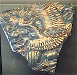 Tile with a phoenix design